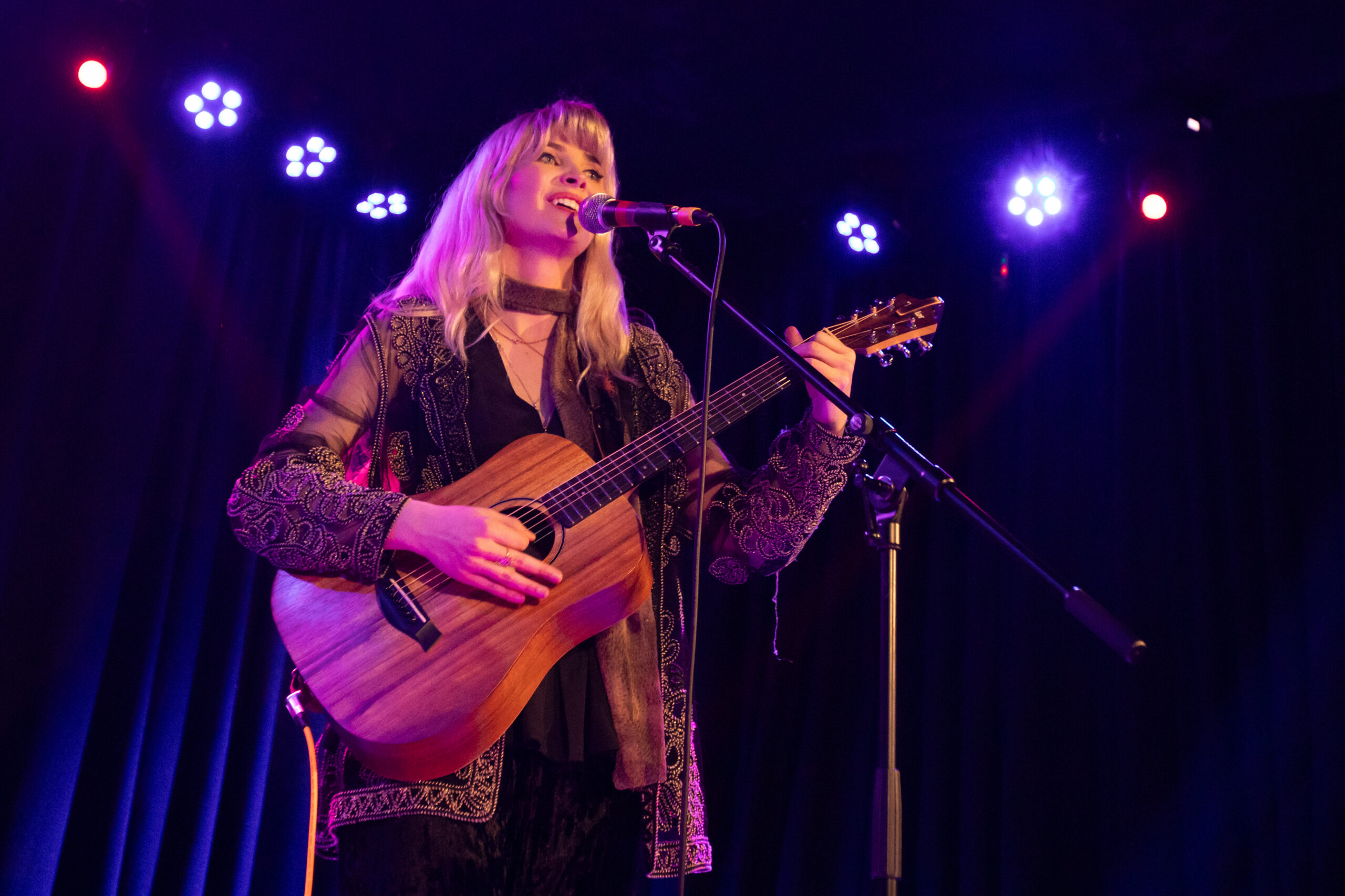 June Holland performing live on tour at The Globe