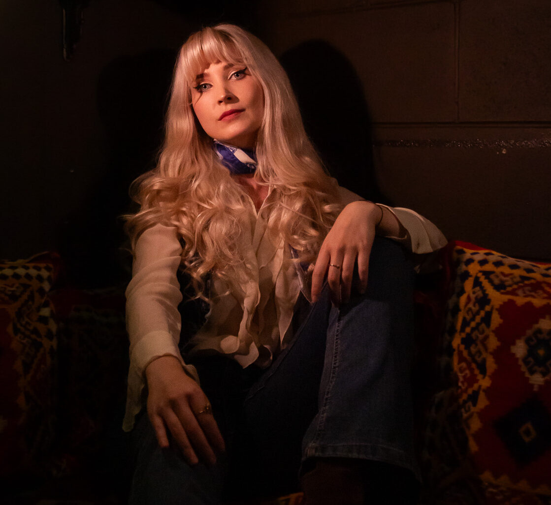 June Holland Photoshoot Low Light in Coffee Shop